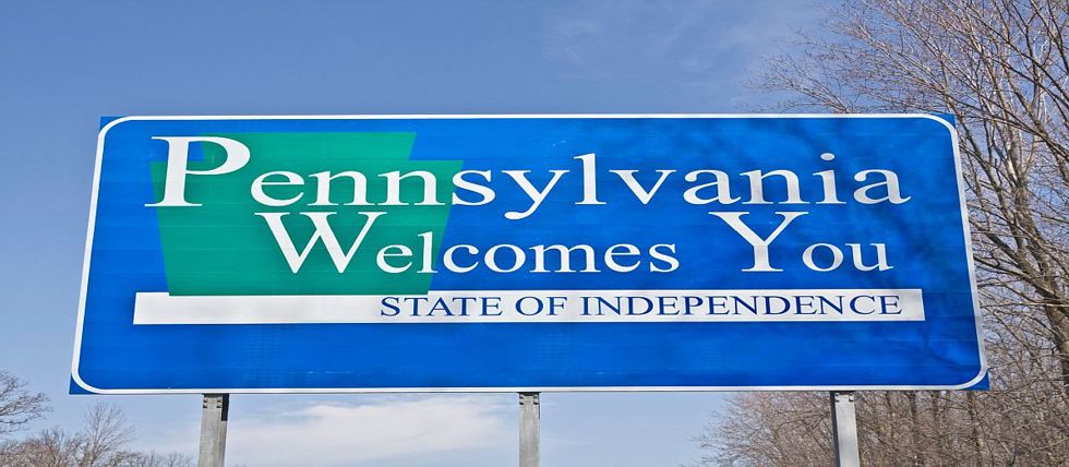 A Welcome to Pennsylvania Sign beside a highway