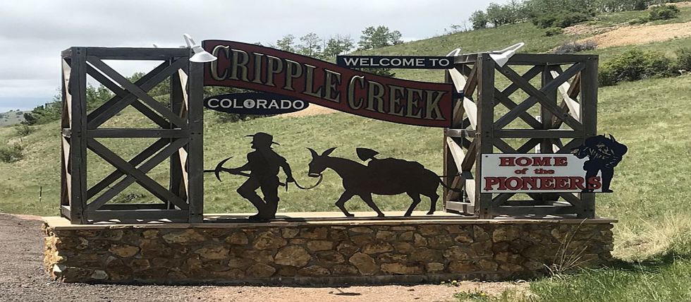 A sign welcoming visitors to Cripple Creek, Colorado
